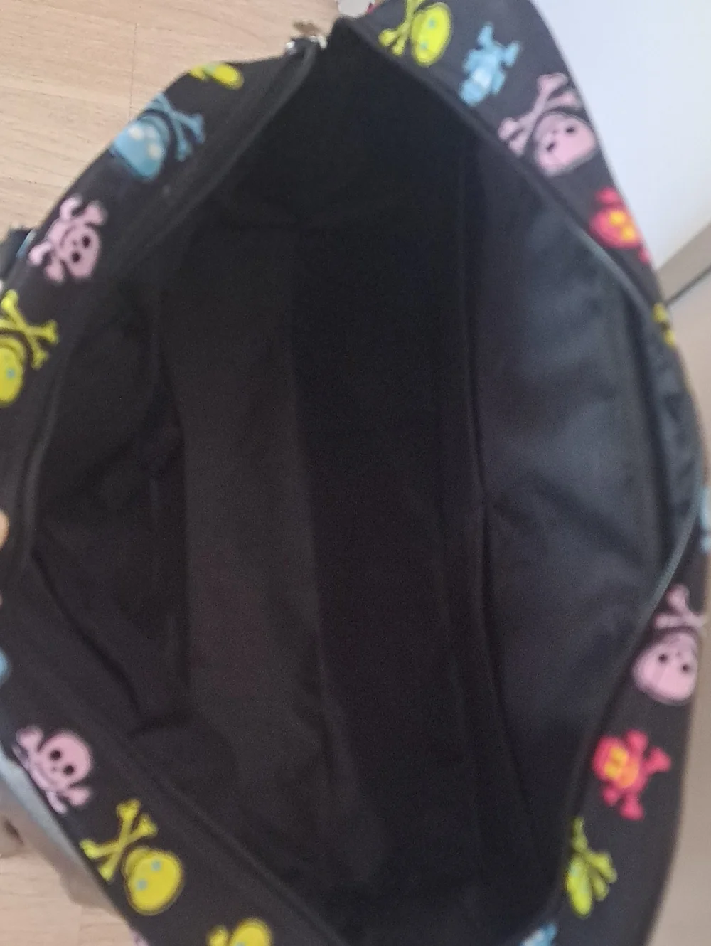 Skulls Design Black Duffel Bag with Multicolor Print